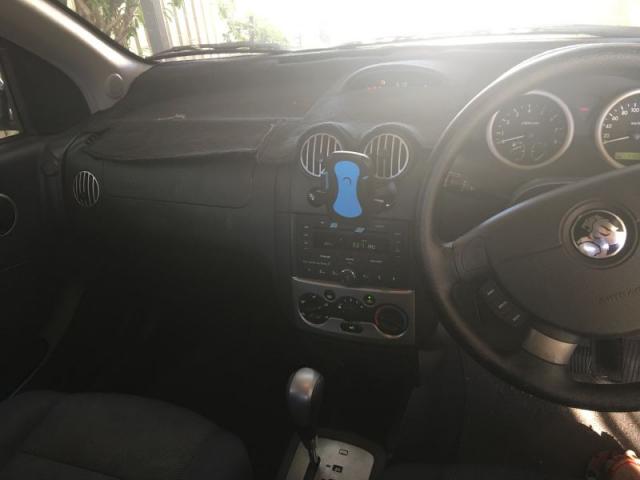  08HOLDEN  BARINA ɫ