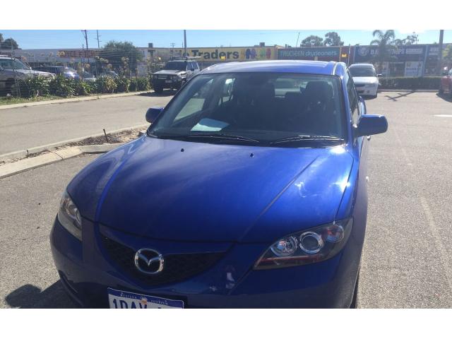2009 Mazda 3 ع  