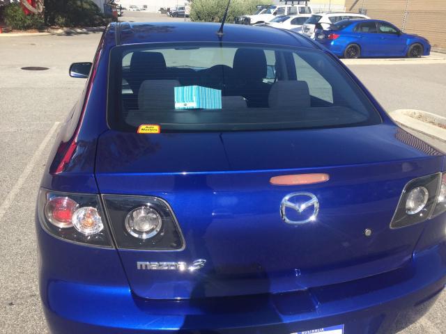 2009 Mazda 3 ع  