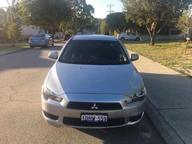 10 Mitsubishi Lance ع
